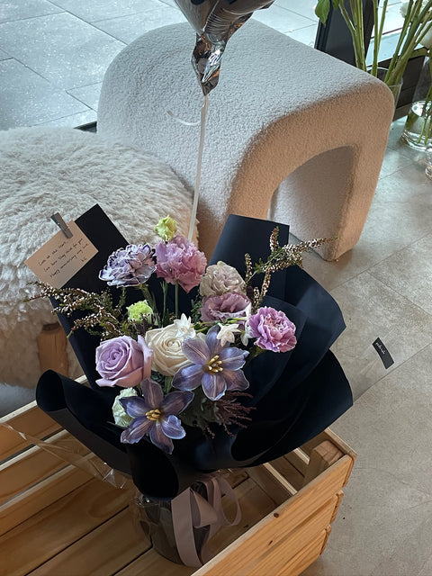 Purple wrapped flowers