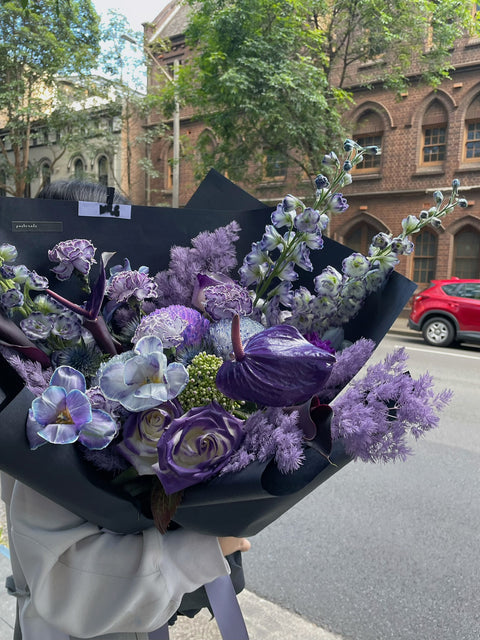 Purple wrapped flowers