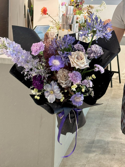 Purple wrapped flowers