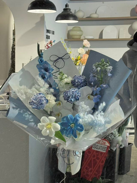 Blue+white wrapped flowers